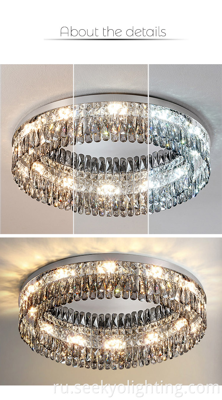 The crystal shade is suspended from a sleek metal frame, giving it a floating effect that adds to its overall elegance.